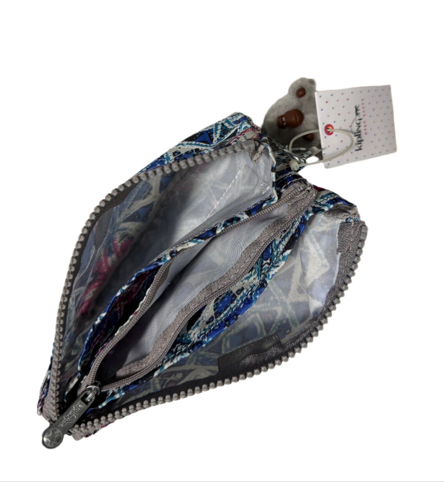 Kipling Creativity Large Pouch in Brightside Sky geometric print with triple zip compartments, compact 7″ × 4.25″ × 1″ size, lightweight water-resistant nylon, ideal for travel and everyday use.