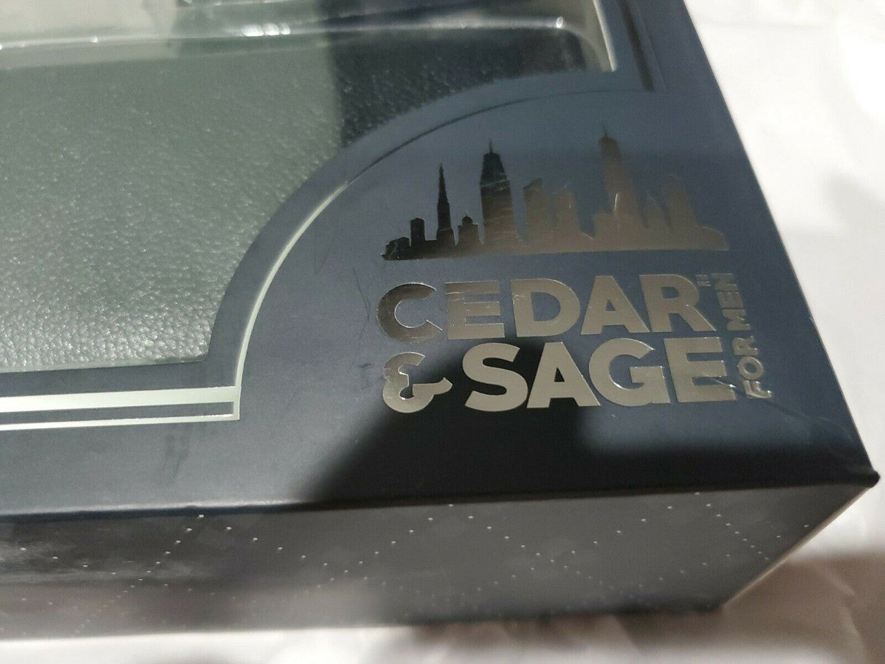 Cedar & Sage 6-piece men’s grooming gift set with beard and skincare essentials in a black presentation box.