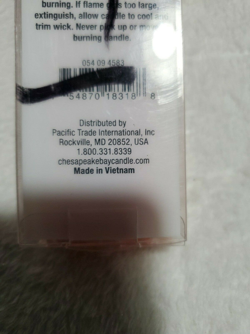 Set of two fragrance-free 10-inch taper candles in terracotta, sealed in a Chesapeake Bay gift pack.