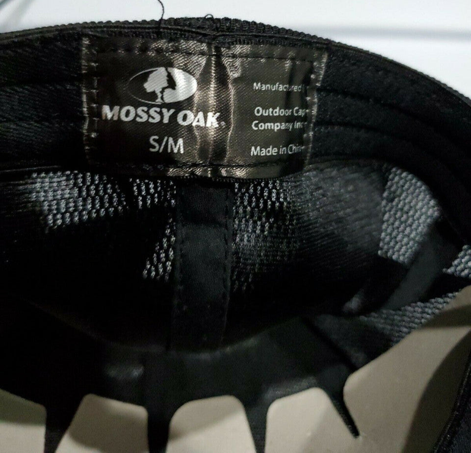 Mossy Oak men’s black camo stretch-fit hat in size S/M with logo patch and breathable mesh back, shown from multiple angles.
