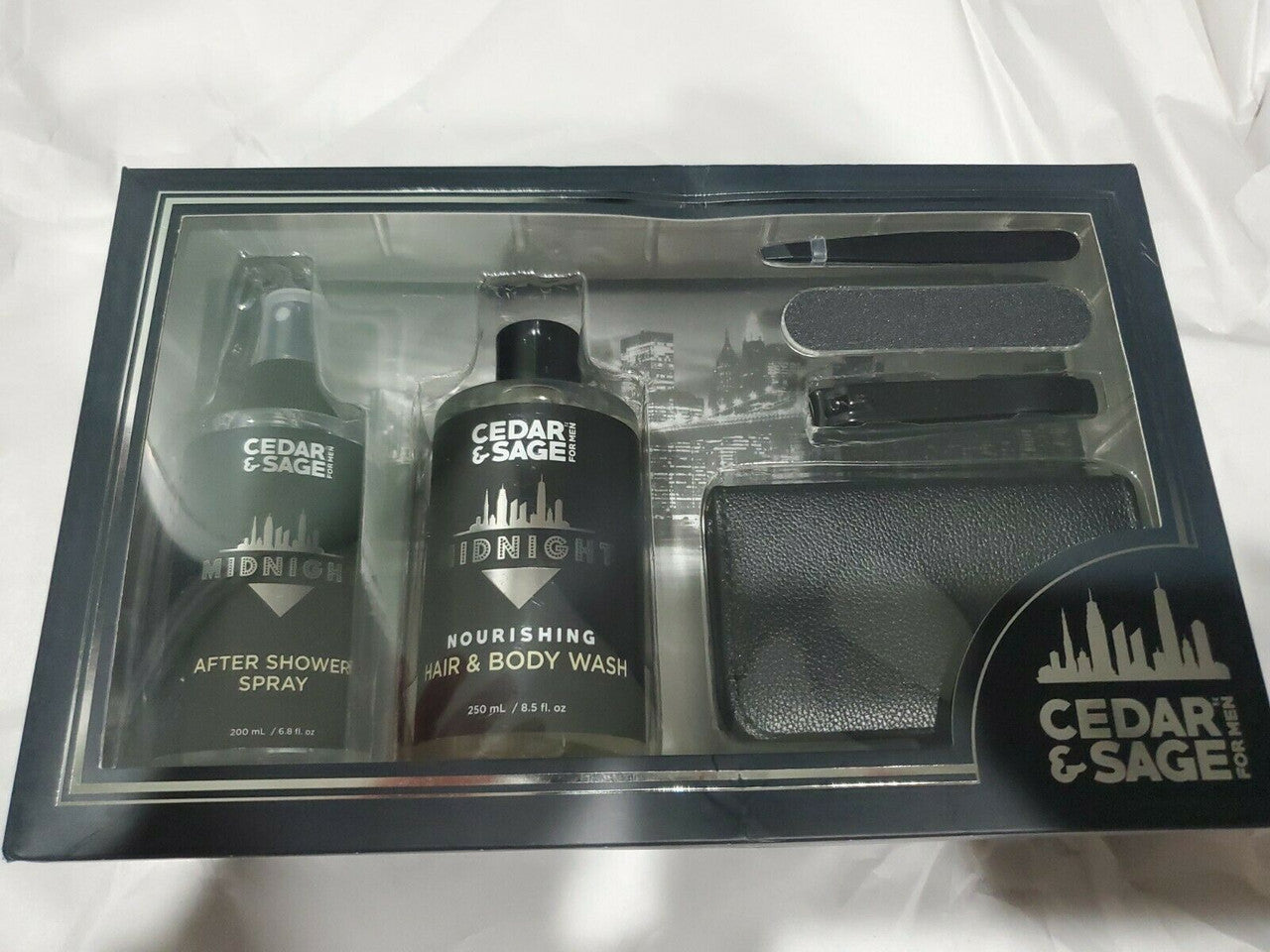Cedar & Sage 6-piece men’s grooming gift set with beard and skincare essentials in a black presentation box.