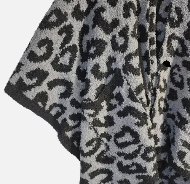 Black and gray fuzzy leopard knit wrap with open poncho-style fit