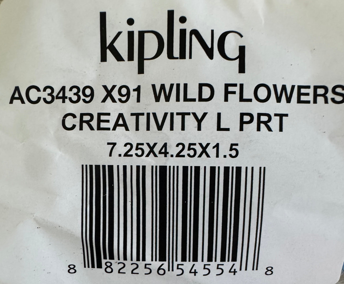 Kipling Wild Flowers Creativity Large Pouch with floral print, triple compartments, and zip closure, ideal for cosmetics and travel organization.