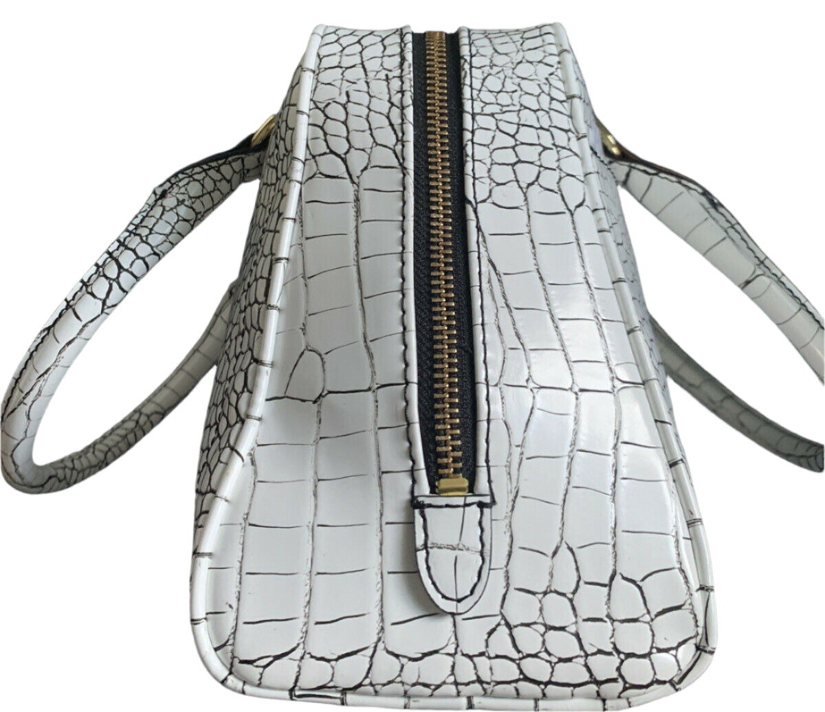 Calvin Klein white crocodile leather handbag with gold accents, adjustable crossbody strap, and black interior with multiple pockets.