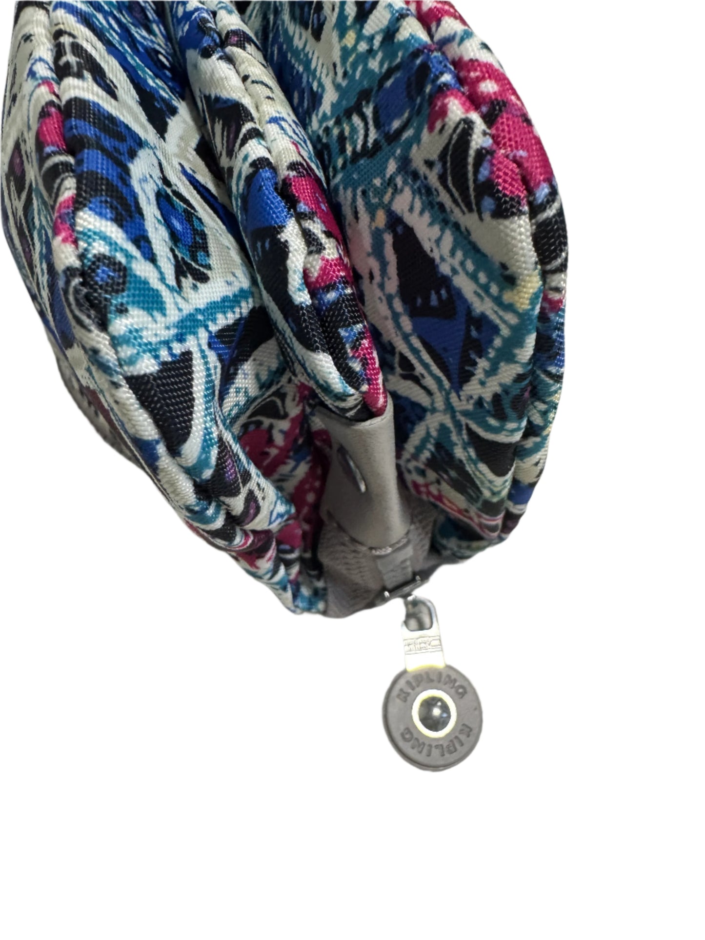 Kipling Creativity Large Pouch in Brightside Sky geometric print with triple zip compartments, compact 7″ × 4.25″ × 1″ size, lightweight water-resistant nylon, ideal for travel and everyday use.