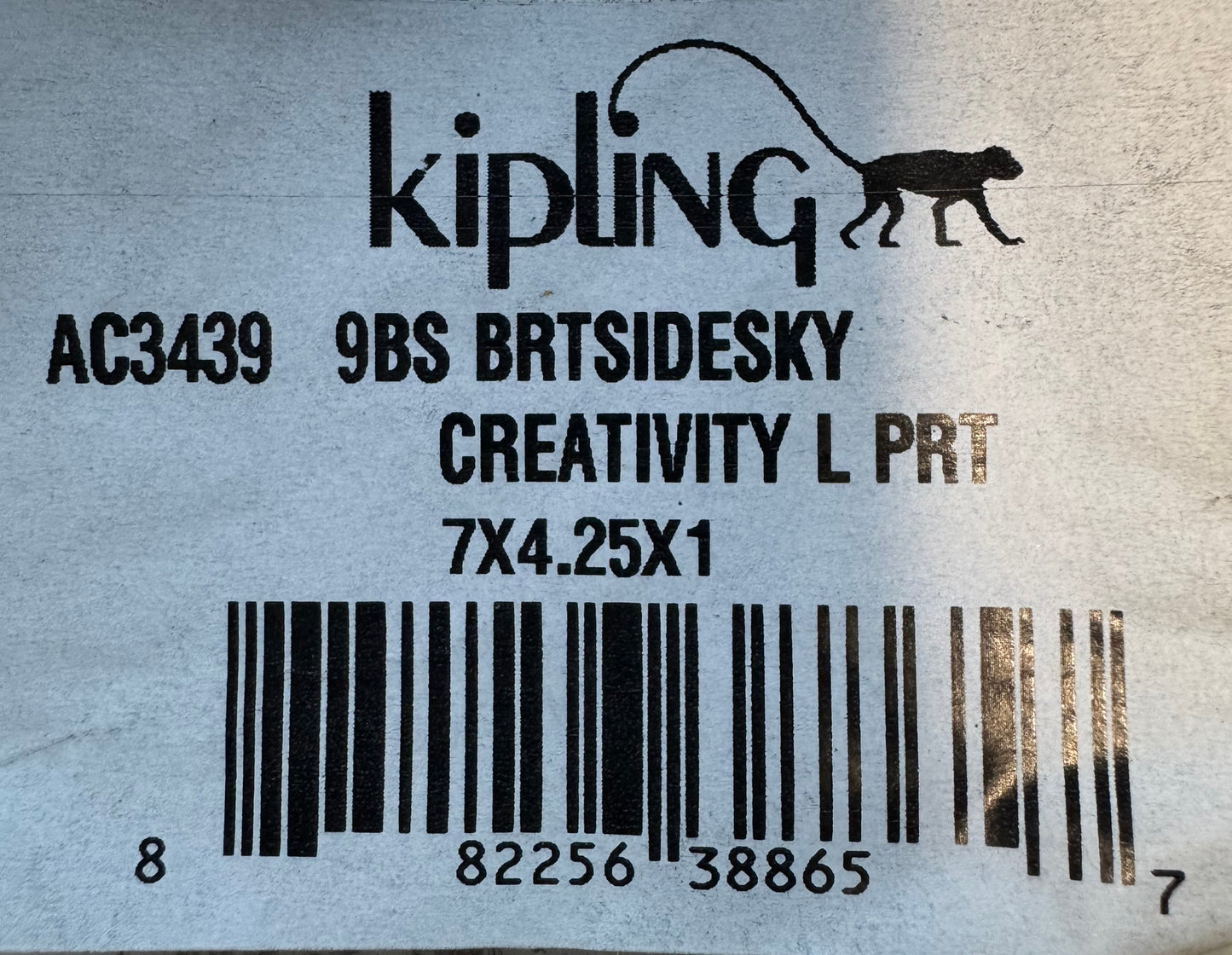 Kipling Creativity Large Pouch in Brightside Sky geometric print with triple zip compartments, compact 7″ × 4.25″ × 1″ size, lightweight water-resistant nylon, ideal for travel and everyday use.