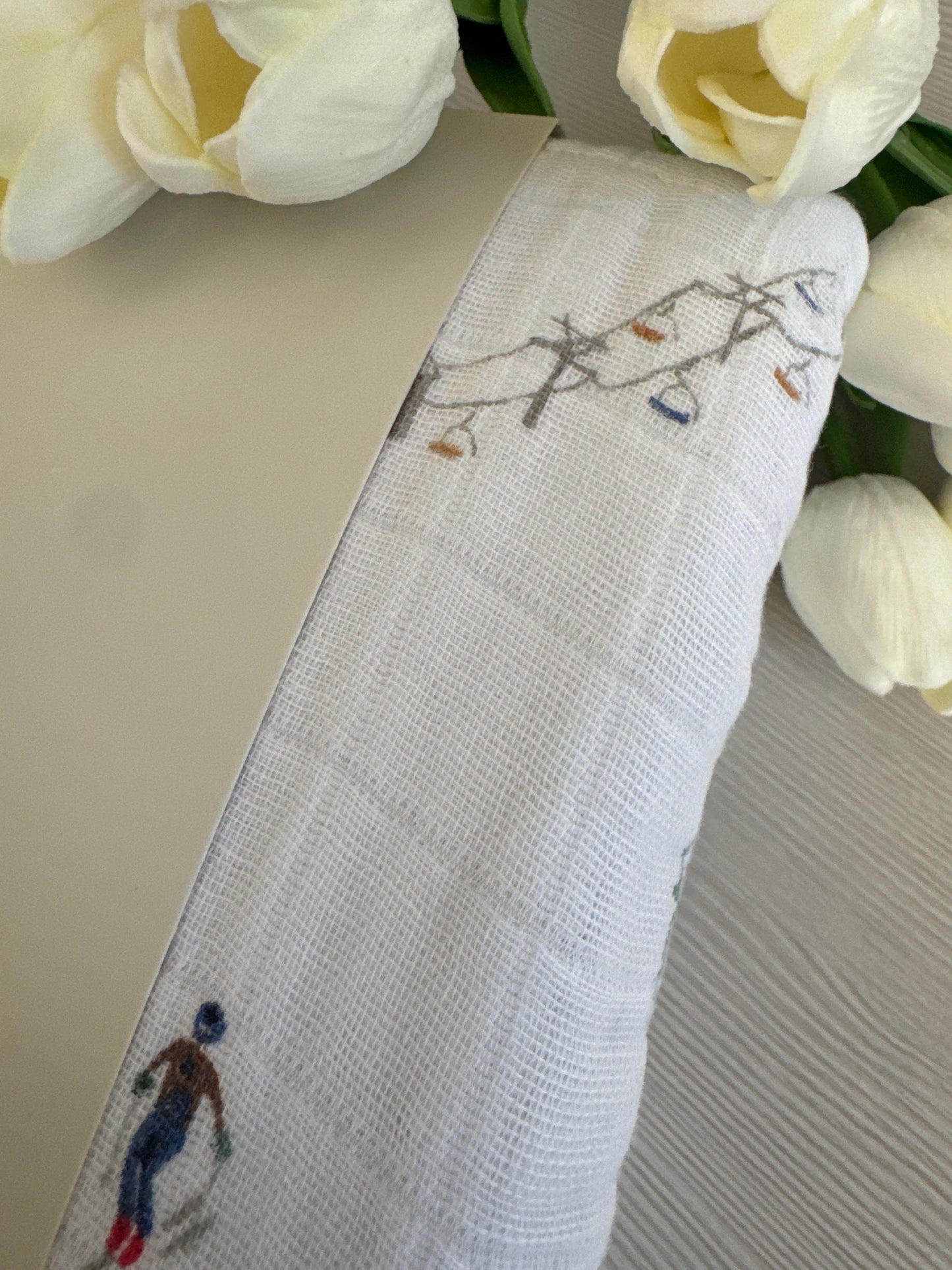 Powder Party Original Cotton Muslin Quilt by Little Unicorn with playful design and soft texture.
