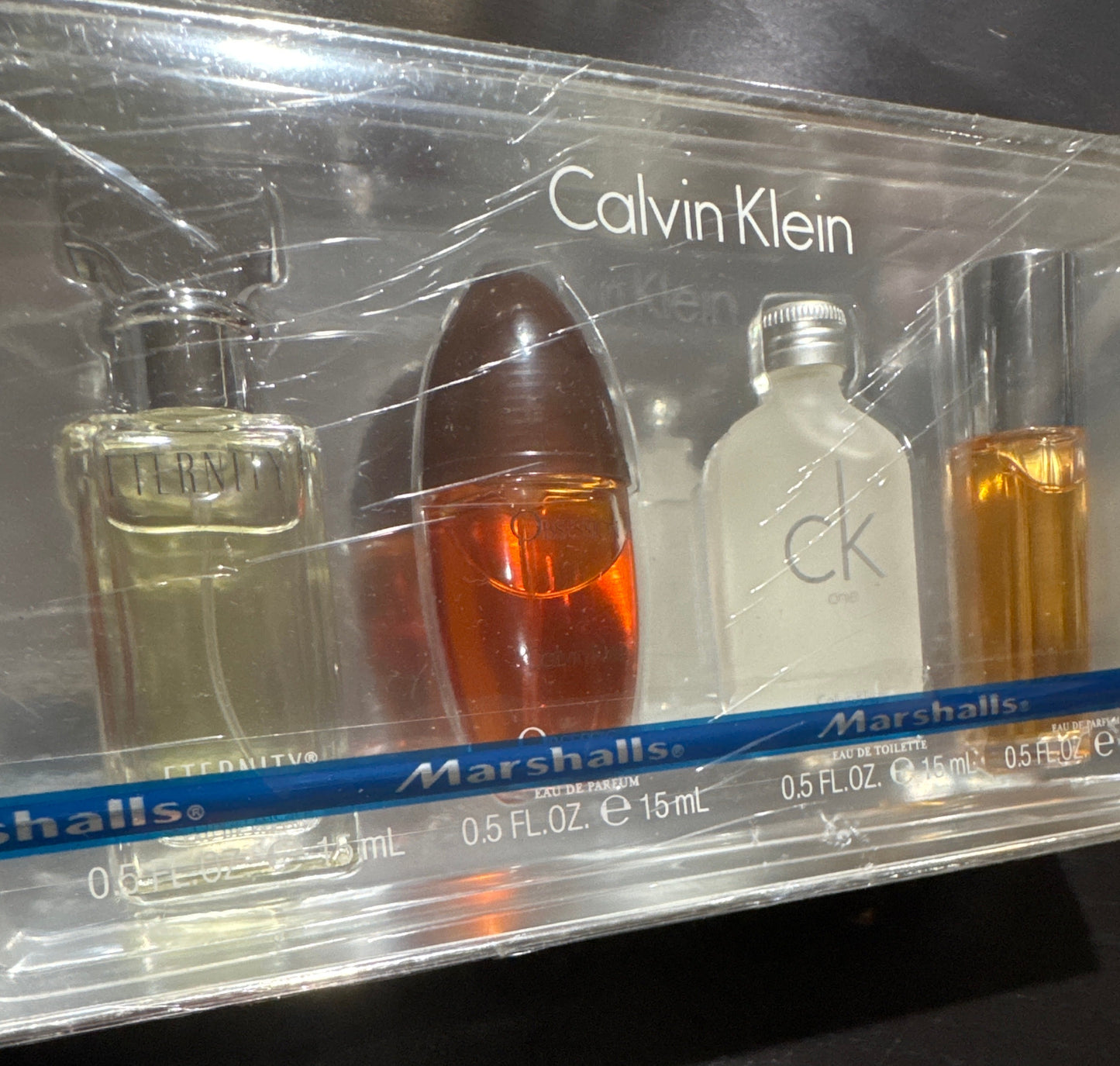 Calvin Klein 5-piece Eau de Parfum gift set with miniature fragrance bottles in clear packaging