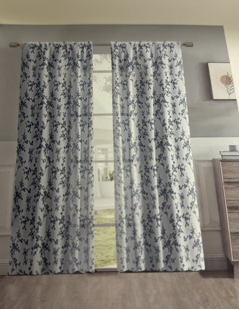 Pair of 38x84 sheer floral curtain panels in soft blue blossom print by Laura Ashley