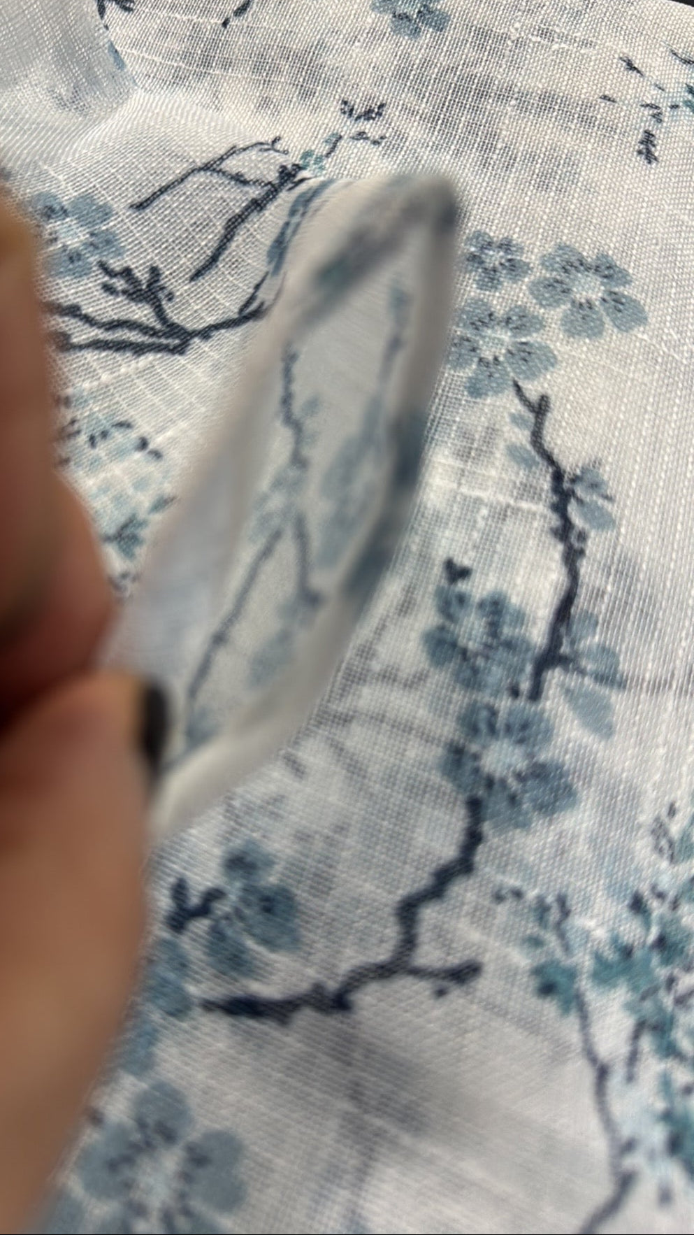 Pair of 38x84 sheer floral curtain panels in soft blue blossom print by Laura Ashley