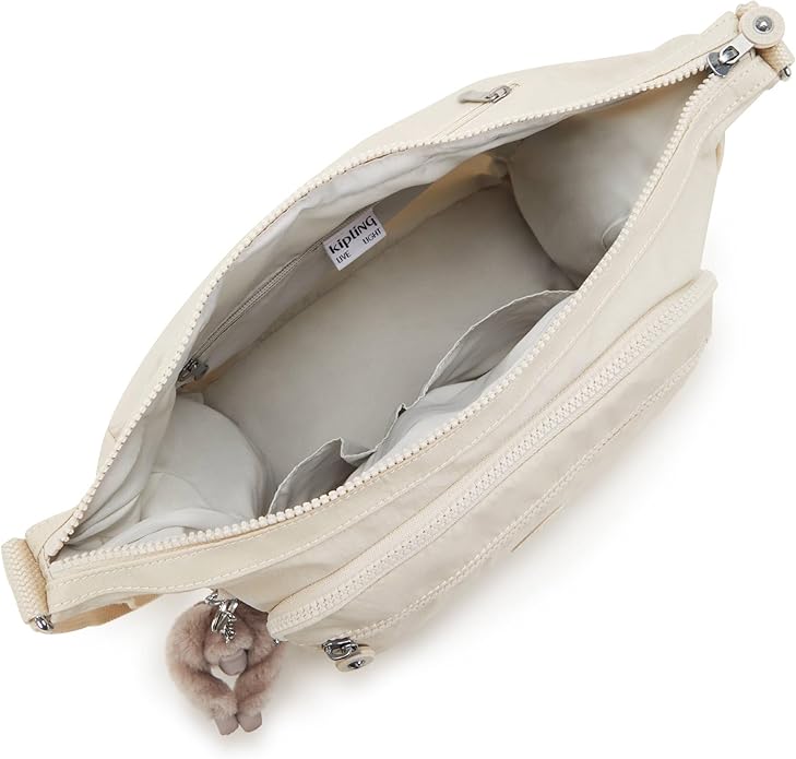 Lightweight cream nylon crossbody shoulder bag with multiple zipper pockets, adjustable strap, and plush monkey keychain – size 11.5" x 8.75" x 6.5"