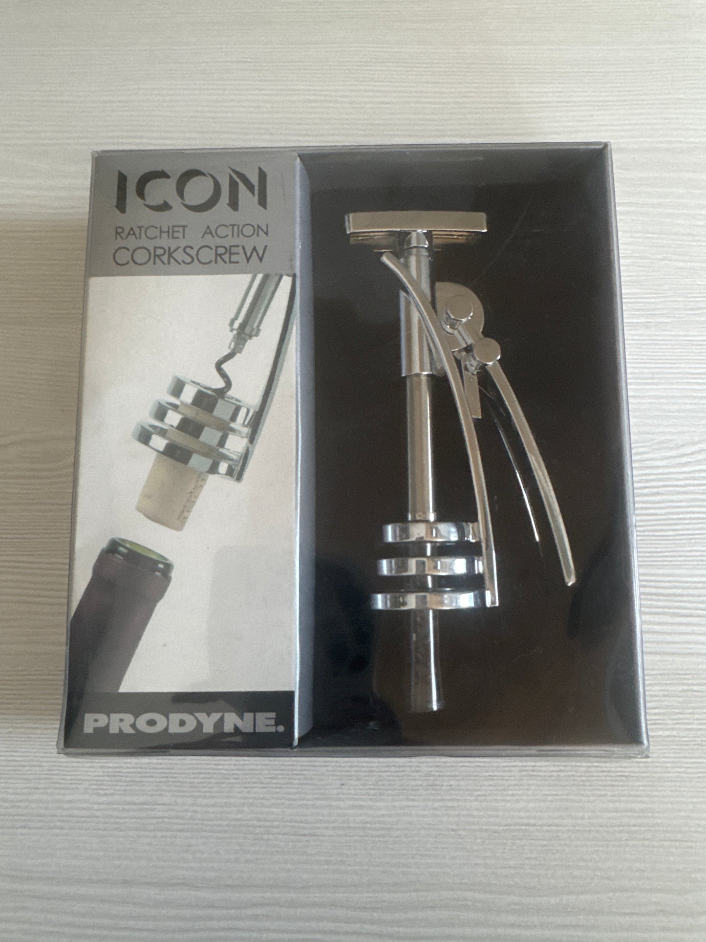 Wine corkscrew ratchet action bottle opener in retail packaging
