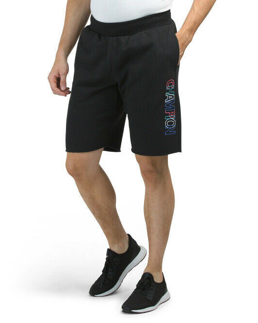 Black fleece cut-off shorts with Champion embroidered logo, raw hem, and side pockets
