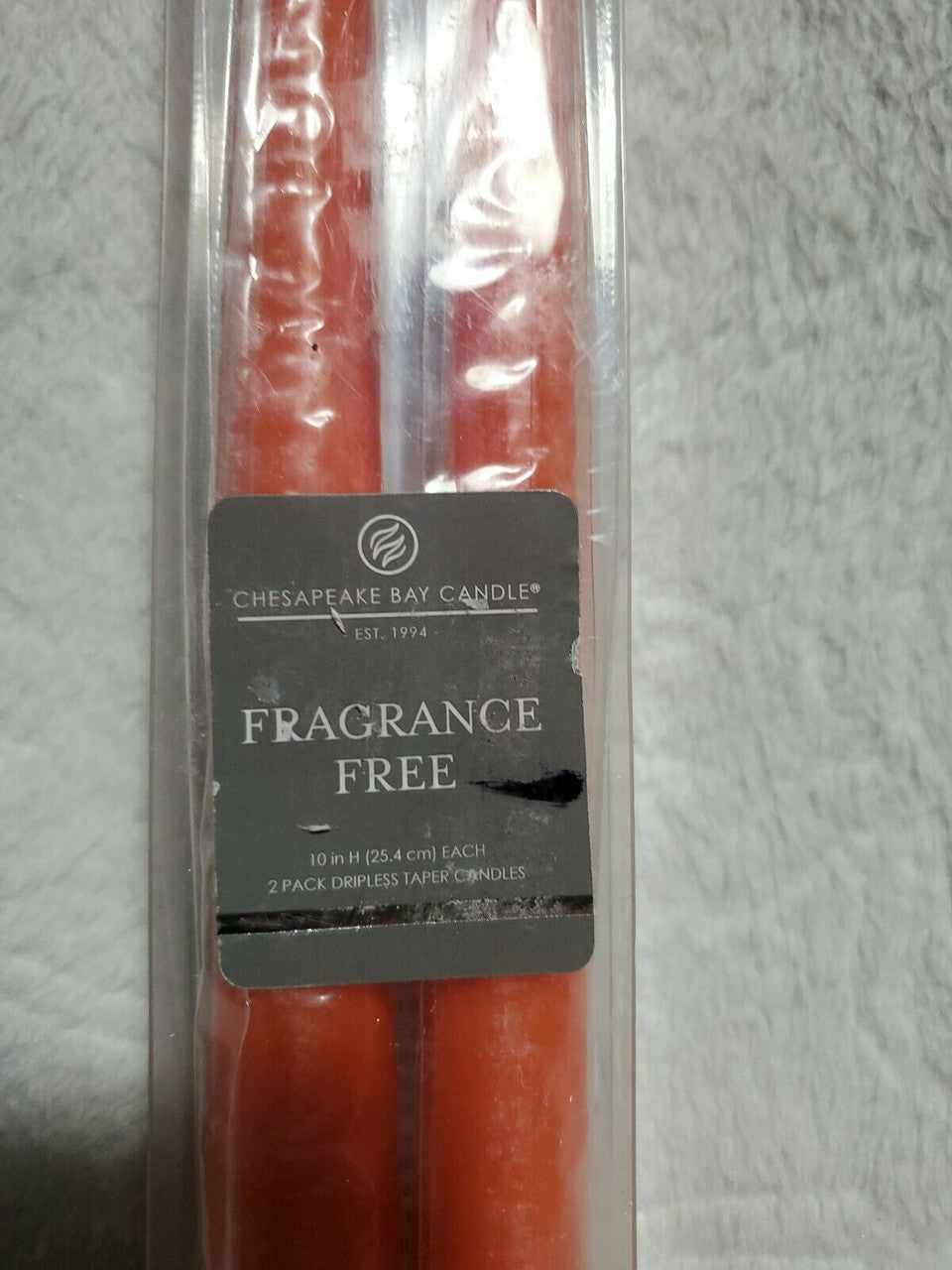 
Set of two fragrance-free 10-inch taper candles in terracotta, sealed in a Chesapeake Bay gift pack.