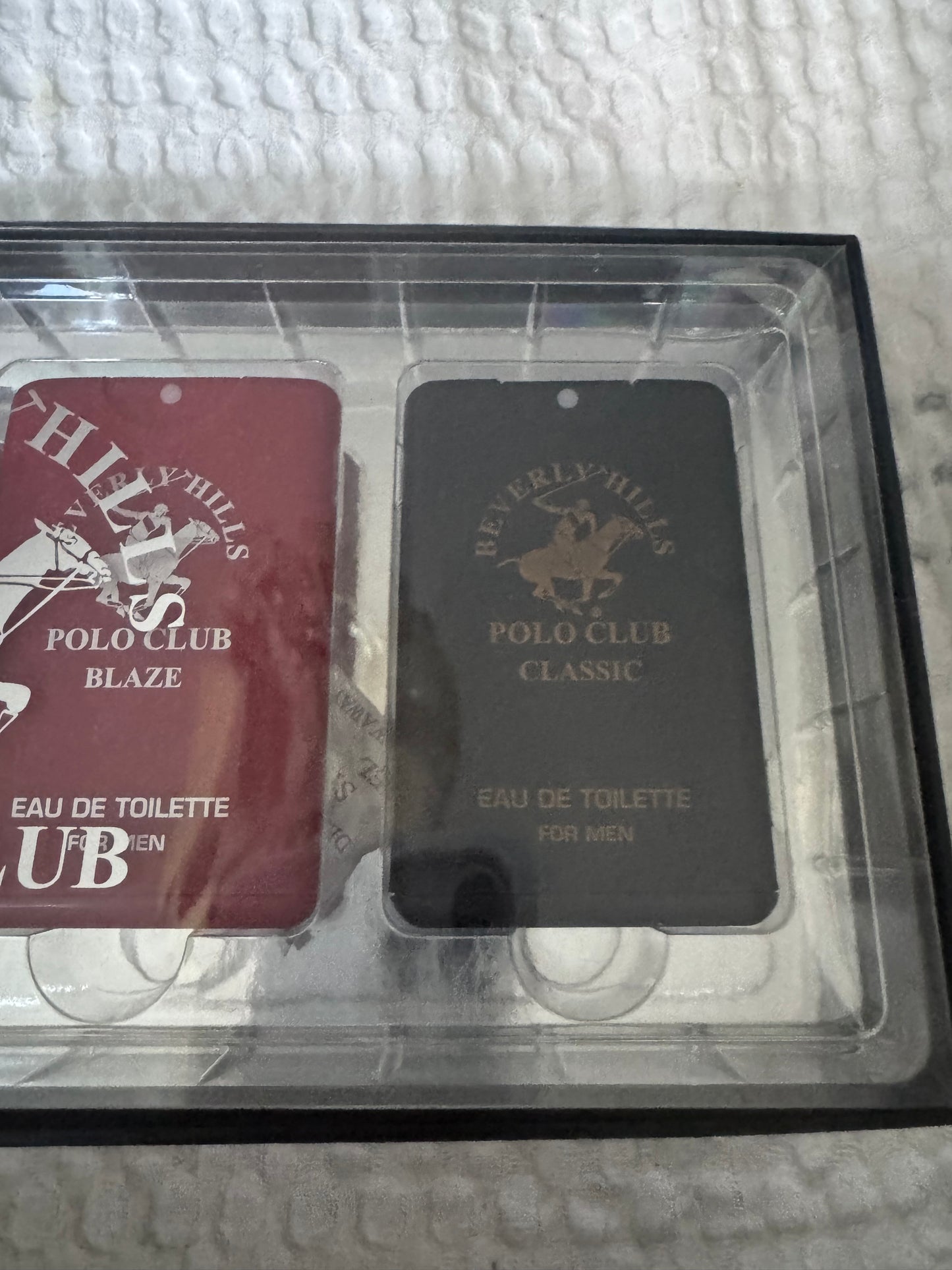 Beverly Hills Polo Club 4-piece men’s eau de toilette gift set with Blue, Sexy, Blaze, and Classic scents in rectangular tins