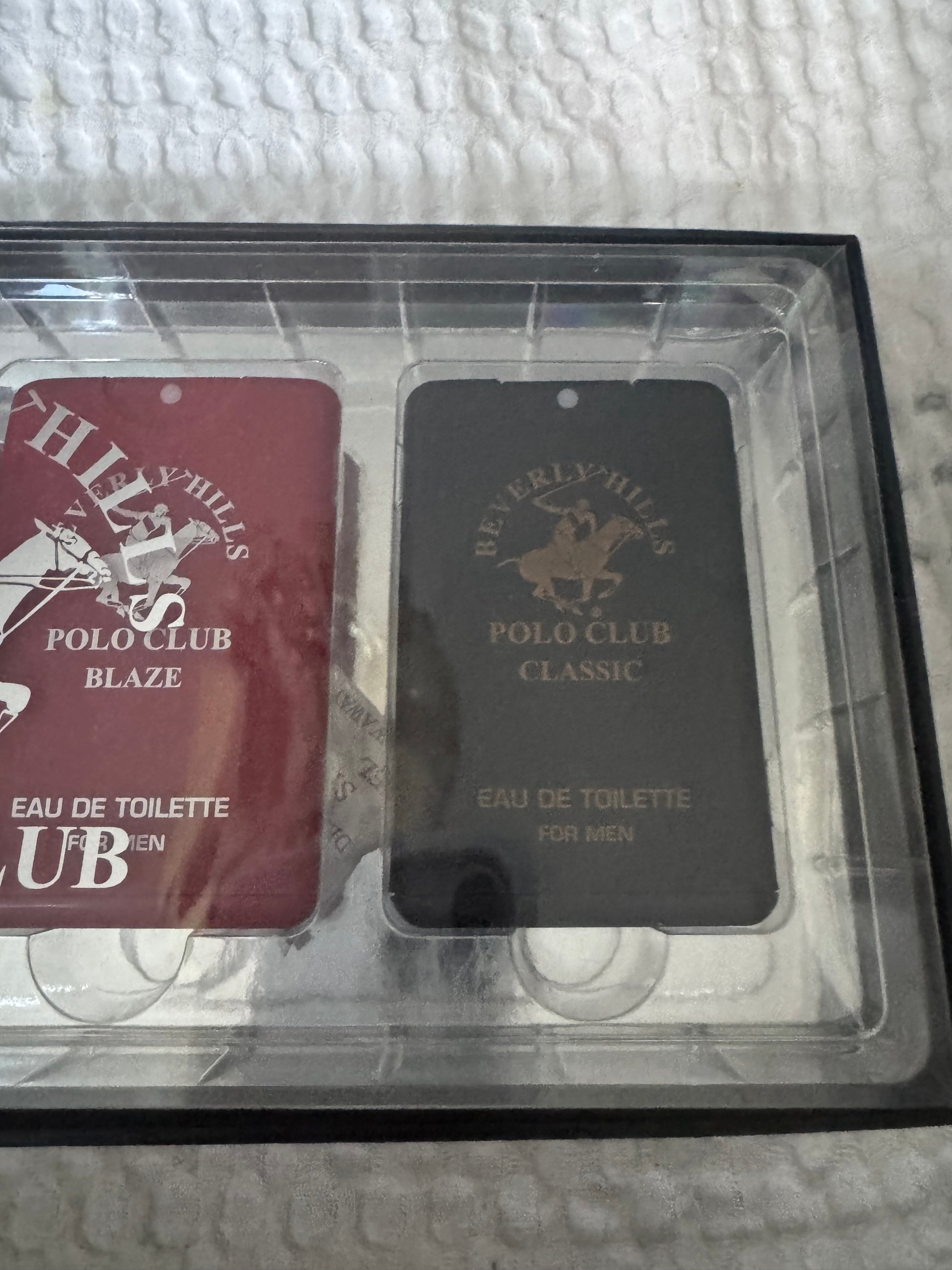 Beverly Hills Polo Club 4-piece men’s eau de toilette gift set with Blue, Sexy, Blaze, and Classic scents in rectangular tins