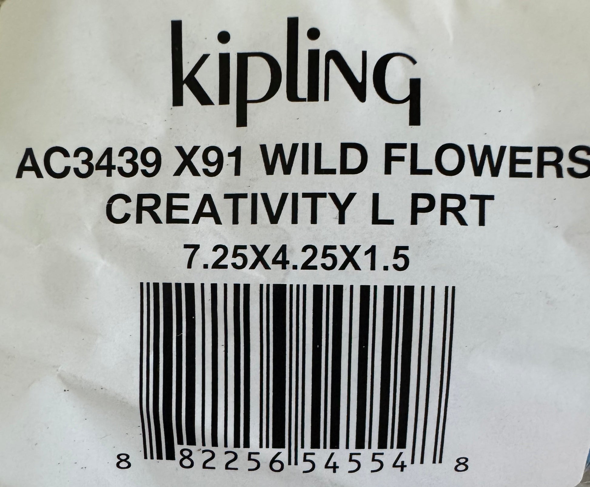 Kipling Wild Flowers Creativity Large Pouch with floral print, triple compartments, and zip closure, ideal for cosmetics and travel organization.