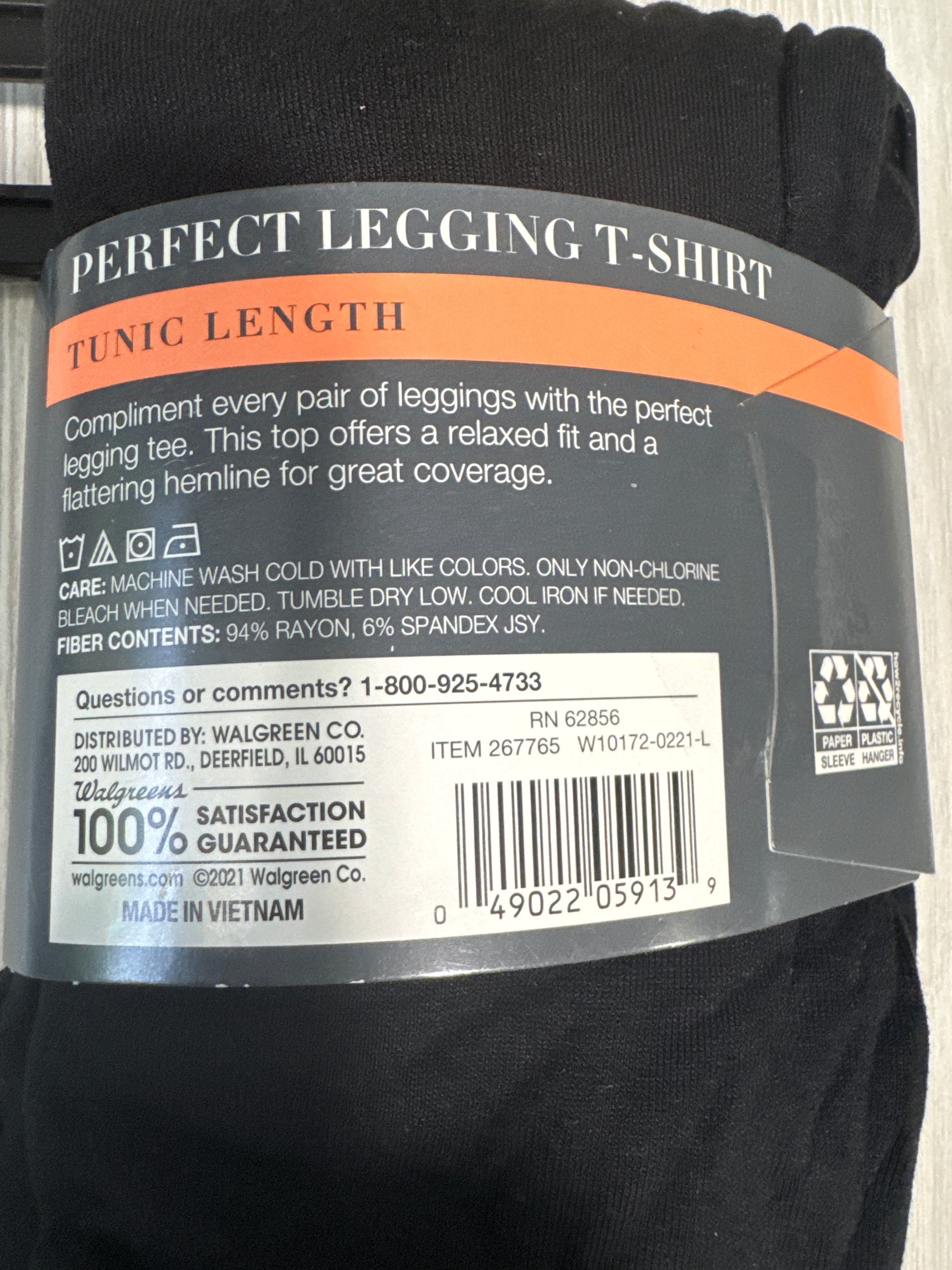 West Loop black tunic-length t-shirt with tag-free label, soft rayon blend, and retail packaging
