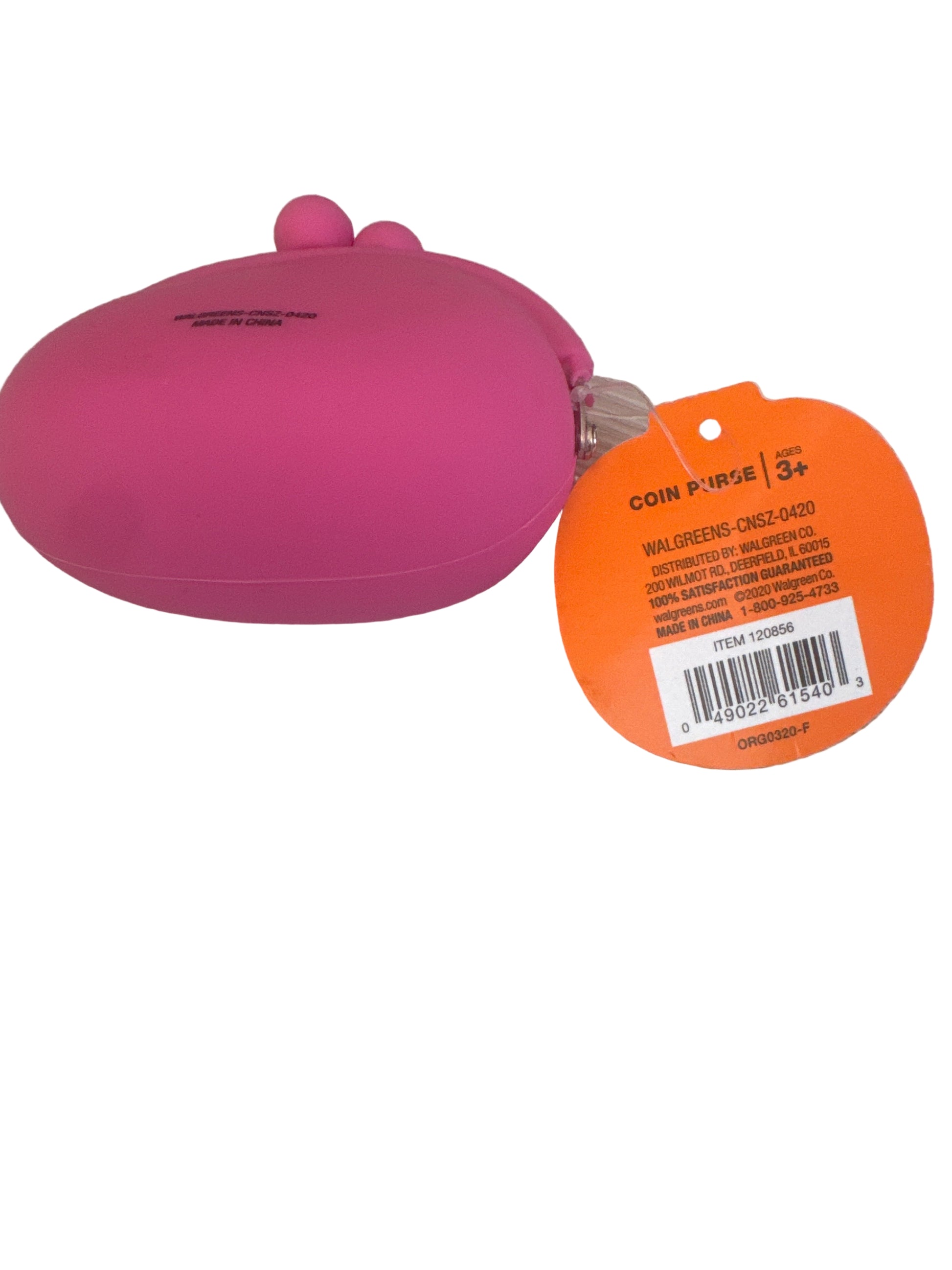 Bright pink silicone coin purse with clasp closure, photographed on a light surface