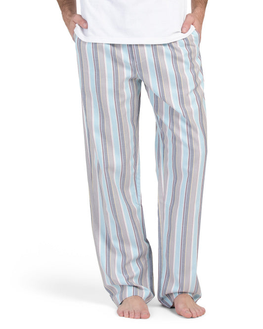 Hanro men's woven lounge pants with blue and neutral stripe print, shown full length with smocked drawstring waistband.